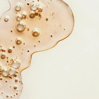 Top view of vitamine C liquid in a white background